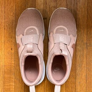 Pink Nike slip on sneakers